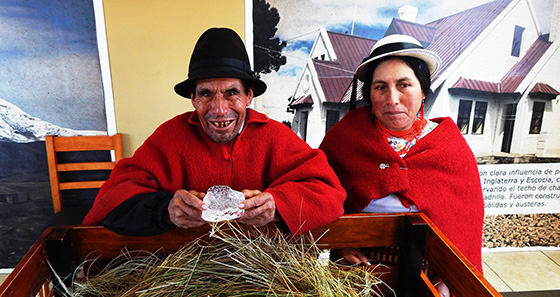 Baltazar Ushca with a woman in traditional clothes in Guano, Ecuador
